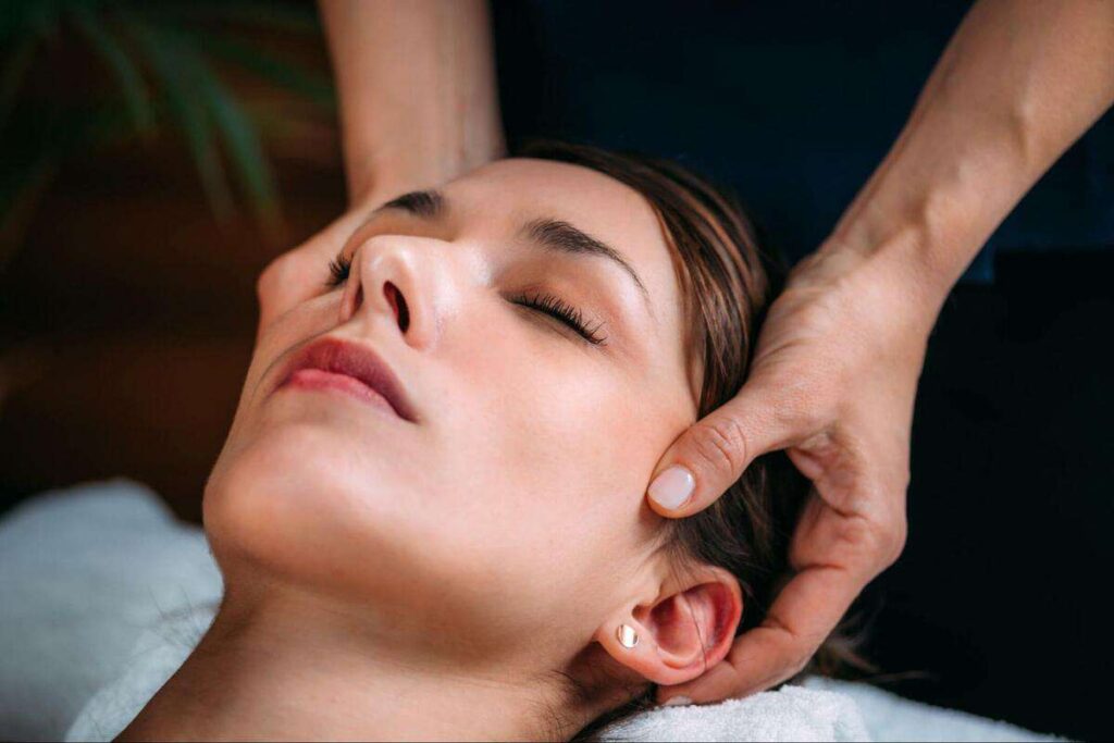 Woman Receiving Cranial Sacral Therapy